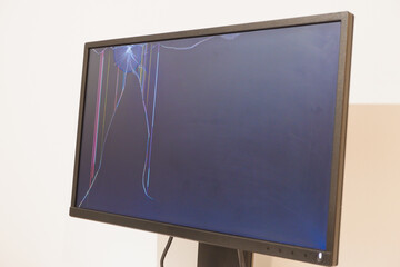 Broken LCD monitor. Cracked LCD Screen. Broken screen of a liquid crystal display, computer monitor.