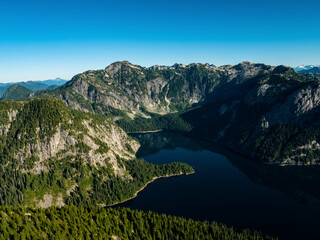 Fototapeta na wymiar Stock aerial photo of mountains and Widgeon Lake, BC, Canada
