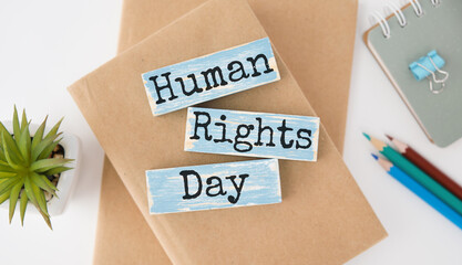 Human rights Day text from wooden blocks on desk
