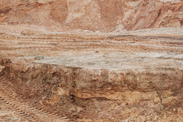 the texture of the sand from the sand career with different traces