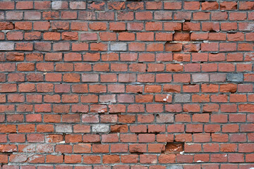 Texture of a wall from old red bricks.