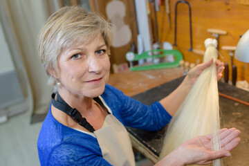 a woman presenting the horsehair