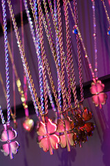 christmas lights and stars, four leaf lucky clover necklaces shining with lights,