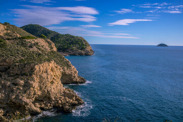 a beautiful coastline, beach, coves and cliffs in Villajoyosa, Alicante, Spain. Walking for the mountain route.