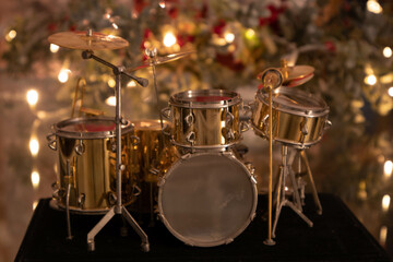 technicaal photography, set of drums with lights on background with bokeh image for greeting card