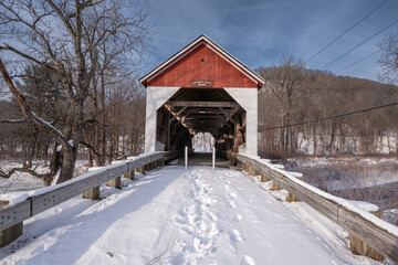A wide  view of the the Arthur Smith Covered Bridge as well as the interior of the bridge that is in northwestern Massachusetts to see the framing and situation around the bridge