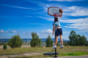 Practice Slam Dunk at Home by Young Man