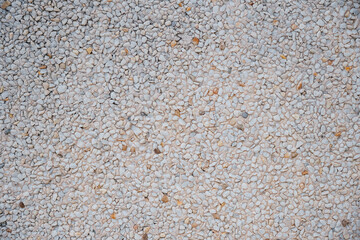 White pebles wall for texture modeling 3D. Small stones wall background. Little rocks wall for pattern. 