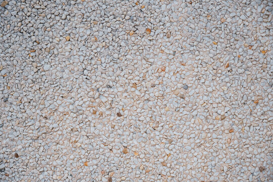 White pebles wall for texture modeling 3D. Small stones wall background. Little rocks wall for pattern. 