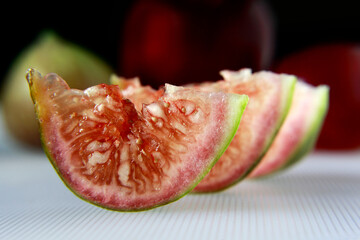 Close up fig fruit slice in against light.