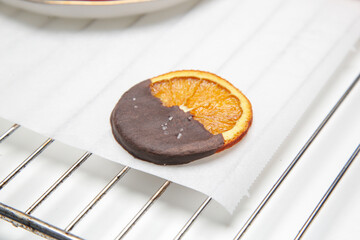 Dark chocolate dipped dry orange slices