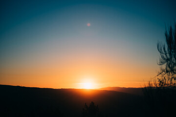 Naklejka premium sunset in the mountains