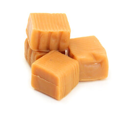 Caramel candies isolated on white background