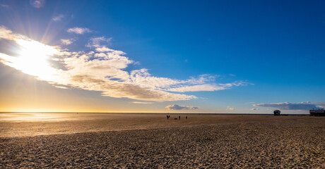The beach and Wadden Sea of St Peter Ording in Germany is a popular tourist attraction - travel photography