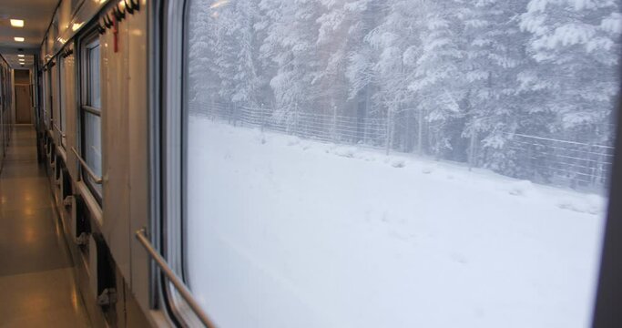 Snowscape Landscape Seen On A Window Of A Traveling Arctic Circle Train From Stockholm (Sweden) To Narvik (Norway)