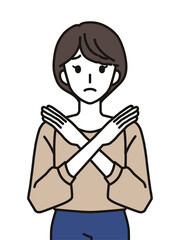 手でばつのジェスチャーをする女性