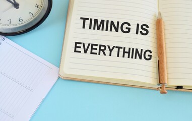 Timing Is Everything text on a Notebook. Chart or mechanism concept.