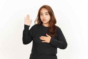 Swearing or Promise Gesture Of Beautiful Asian Woman Wearing Black Shirt Isolated On White
