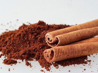 Star anise and cinnamon stick isolated on white background, top view