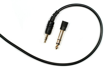Audio cable with 3.5 and 6.3 mm connectors for headphone connection.