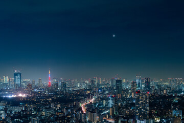 Wide panorama image of Tokyo night view with Lunar ecripse