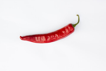 Red chili pepper on white background.