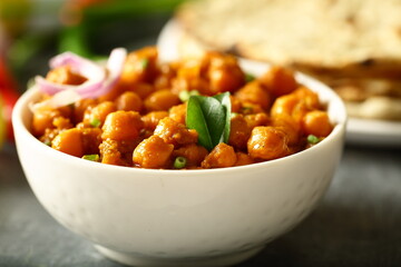 Bowl of chickpeas curry, chana, masala, Indian traditional vegetarian recipes.