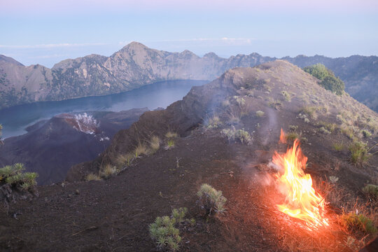 This picture was taken on the way to the top of the Rinjani Volcano before the earth quake. Campfire was set up by guides to warm the climbers who are waiting for the sunrise