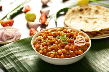 North Indian cuisine- Homemade delicious  organic chickpeas curry roast, chana masala. Punjabi dhaba style cooking.