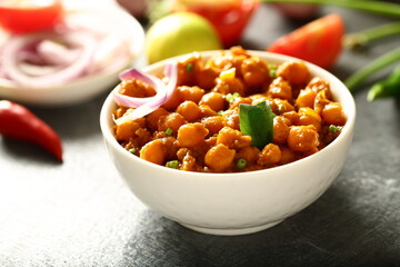 Indian vegetarian cooking- homemade spicy chickpeas curry, chana, channa, masala,