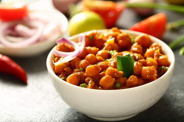 Indian vegetarian cooking- homemade spicy chickpeas curry, chana, channa, masala,
