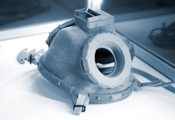 Gray respirator model printed on 3d printer from powder polyamide close-up. 3D prototype created by...