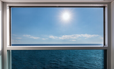 Fototapeta na wymiar French balcony of cruise ship with sea view. Open veranda window with modern railing.