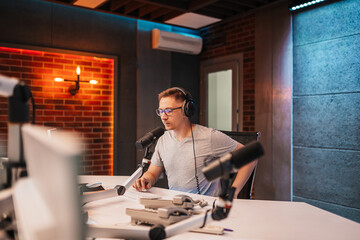 The DJ hosts the program and communicates with the audience on air at the radio station. The...