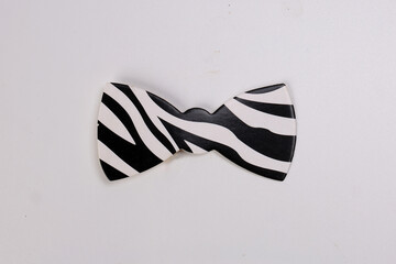 Black white bow tie shape paper die cut selfie portrait party fun paper prop sticker stick on white background