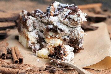 a multi-layered cake made of chocolate and cream cakes