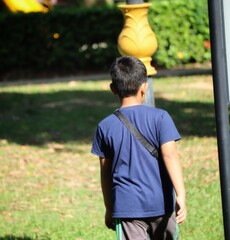 Fototapeta premium boy walking in the park