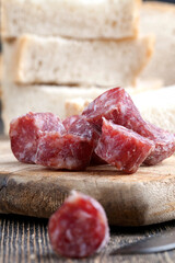 sliced sausage of dried meat with bacon