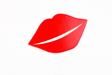 Red female lip shape paper die cut selfie portrait party fun paper prop sticker stick on white background