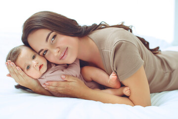 Obraz na płótnie Canvas Mom with a baby at home. High quality photo