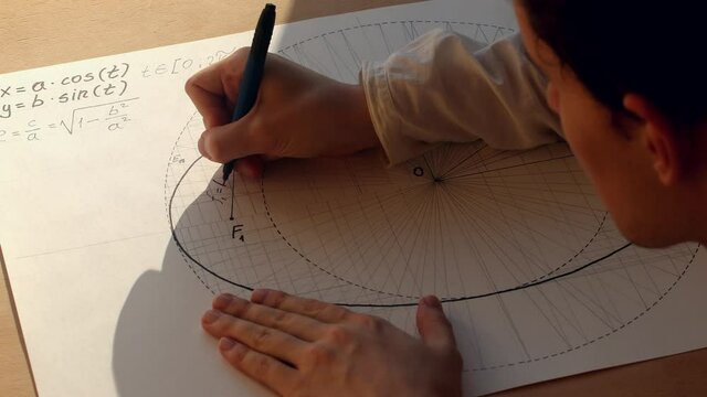 Young mathematician Pavel Kubarkov writes the focal radius for the point on ellipse. Date of shooting day 24 November 2021 year. This video was filmed in Russia.