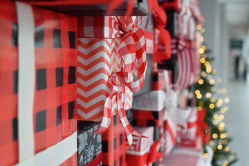 Close up of festive Christmas gift boxes. Selective focus.