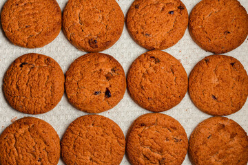 delicious homemade oatmeal cookies lie on a white cloth