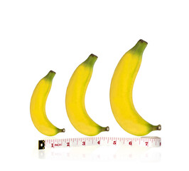 Bananas and measuring tape isolated on white  background.