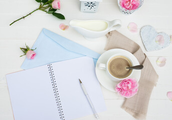 Obraz na płótnie Canvas Coffee mug, Milk, Pink Rose Flowers, Heart, Sketchbook Mock up on White Wooden table. Happy Valentine's Day, Mother's Day, Women's day, Wedding, Happy Birthday, Love Background or Good Morning