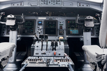 Knobs and buttons. Close up focused view of airplane cockpit