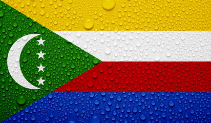 Comoros flag on water texture. 3D image