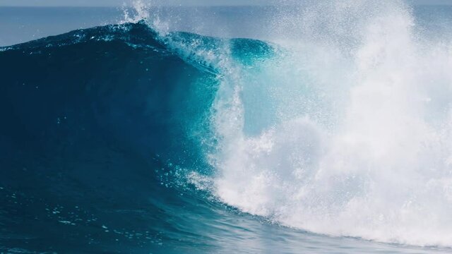 Wave. Powerful ocean wave breaks at the Sultans surf spot in Maldives