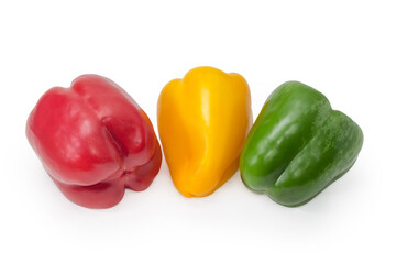 Three bell peppers different colors on a white background