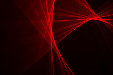 Abstract red lines drawn by light on a black background